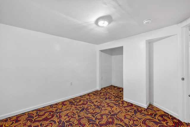 unfurnished bedroom featuring baseboards