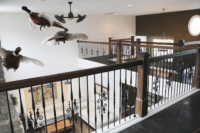 interior space featuring wood finished floors and recessed lighting