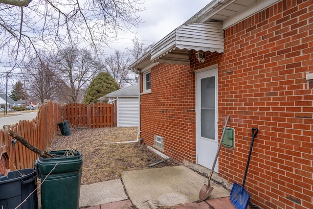 view of patio featuring fence