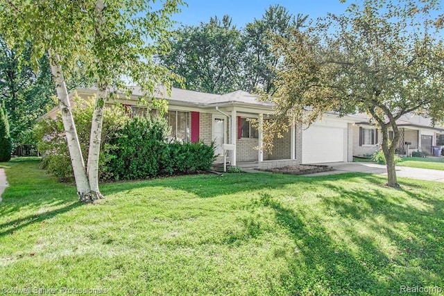 ranch-style home featuring an attached garage, a front yard, concrete driveway, and brick siding