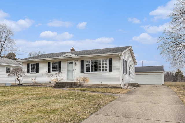 view of front facade featuring an outbuilding, a shingled roof, a detached garage, a chimney, and a front yard