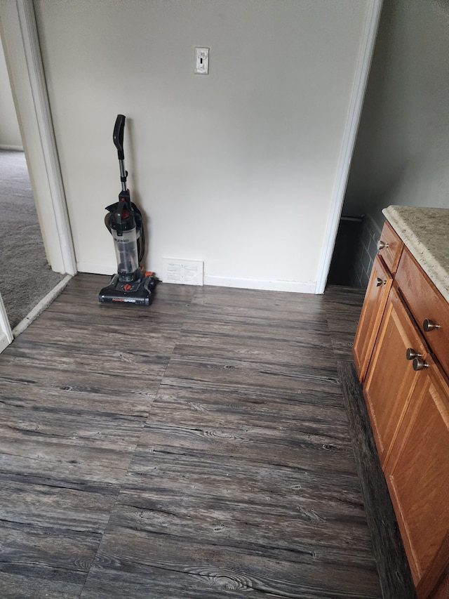 interior details featuring wood finished floors and visible vents