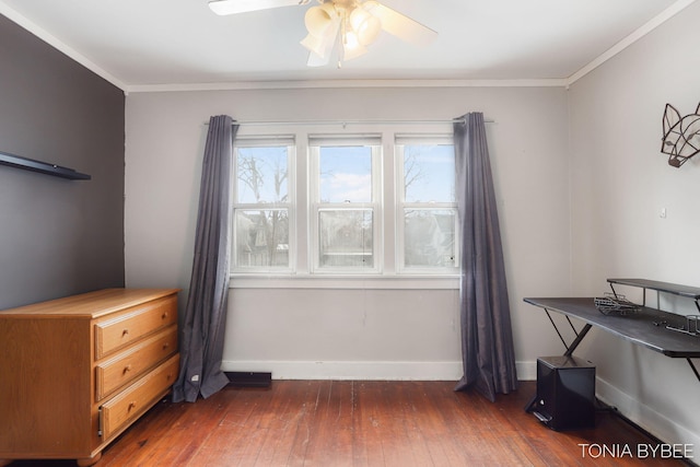 bedroom with baseboards, hardwood / wood-style floors, and ornamental molding