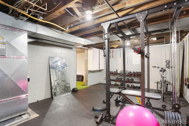 workout area featuring heating unit