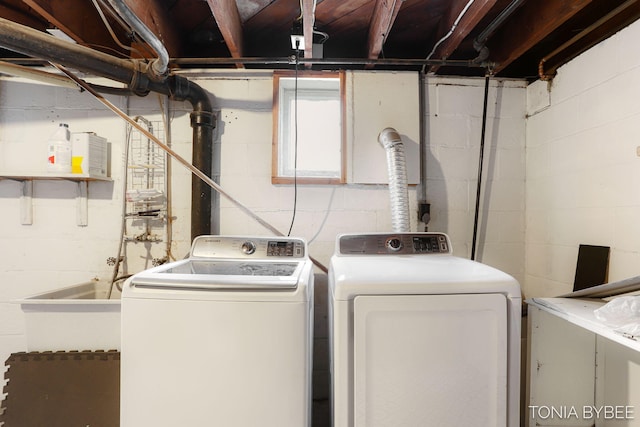 laundry area featuring laundry area and separate washer and dryer