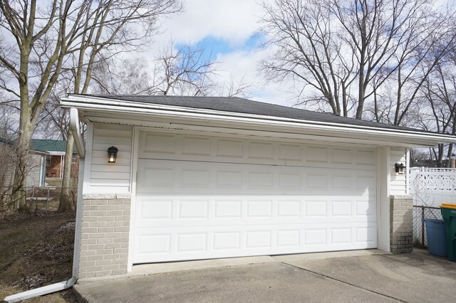 detached garage with fence