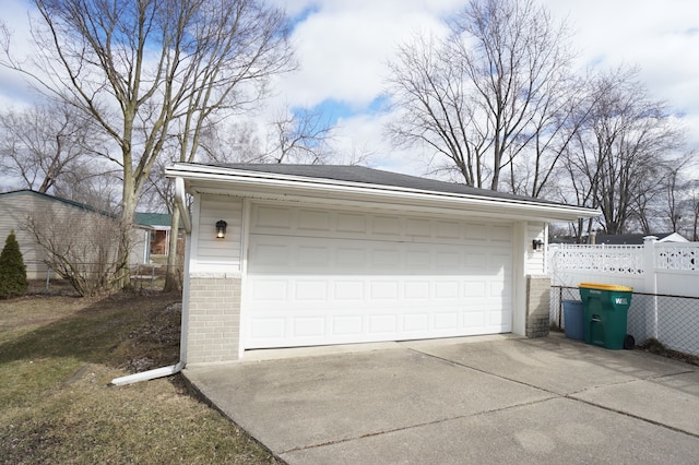 detached garage with fence