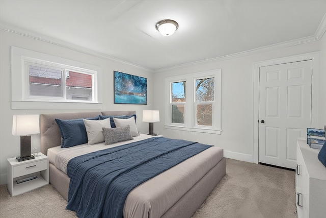 bedroom with ornamental molding, light colored carpet, and baseboards