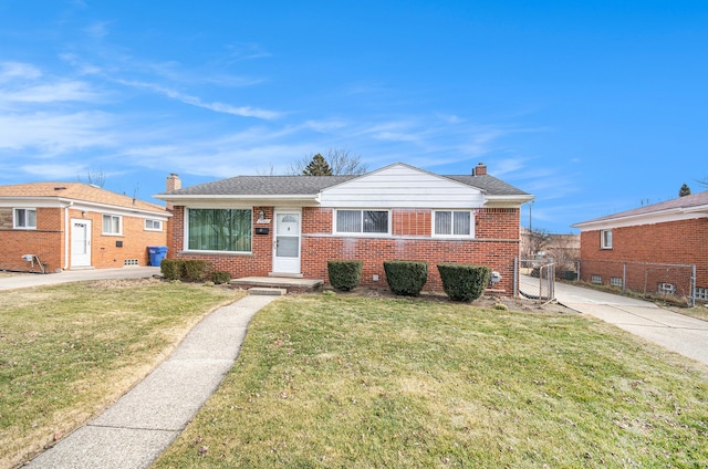 bungalow-style home featuring a front yard, a chimney, fence, and brick siding