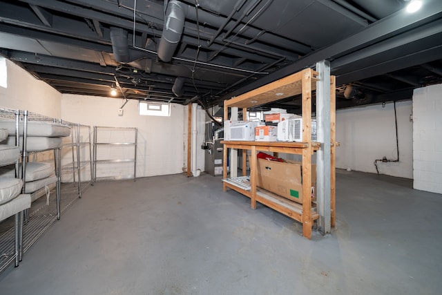 basement featuring concrete block wall