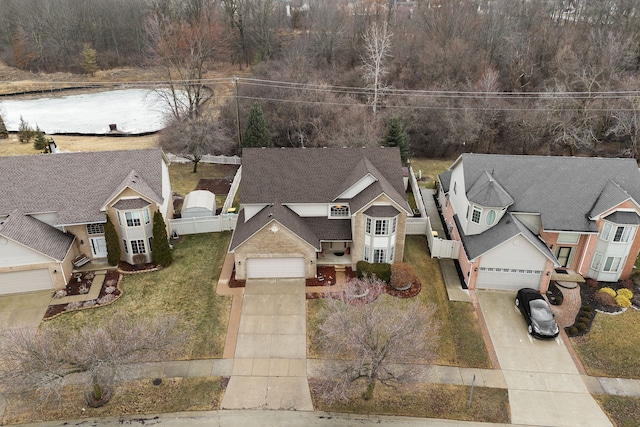 birds eye view of property with a residential view