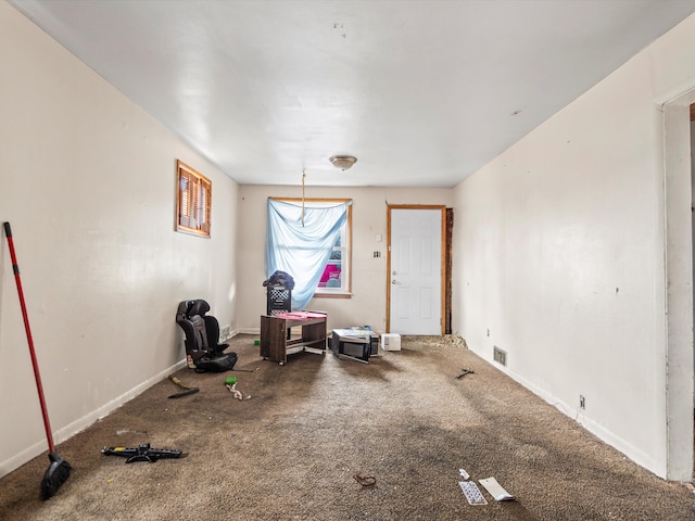 dining space featuring carpet, baseboards, and visible vents