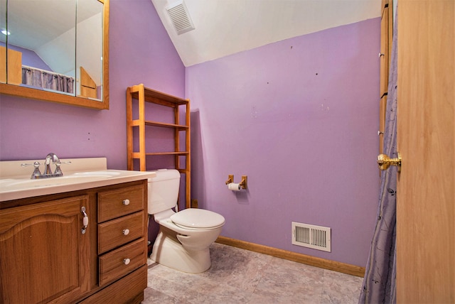 bathroom featuring lofted ceiling, baseboards, visible vents, and toilet