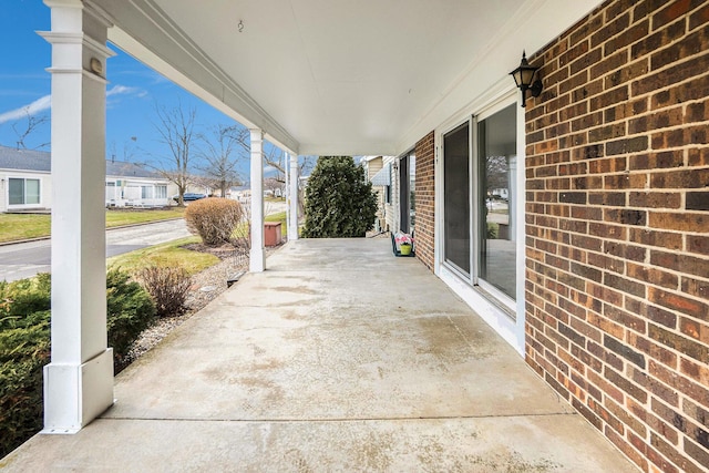 view of patio featuring a porch