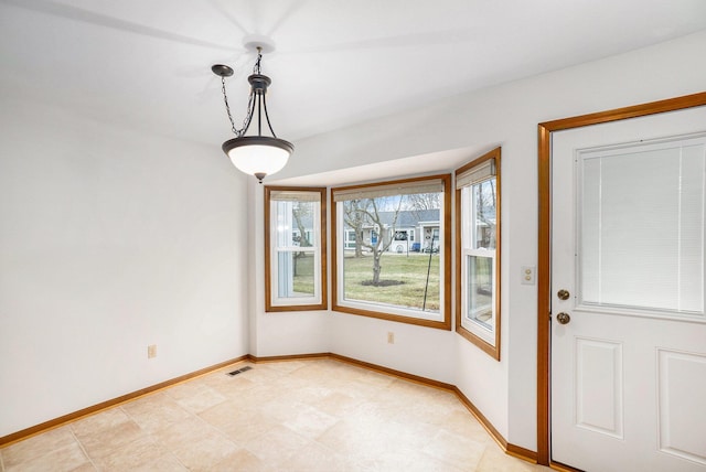 interior space featuring visible vents and baseboards