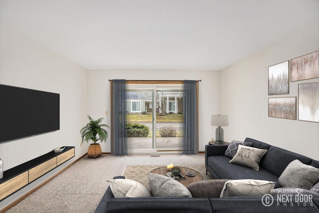 carpeted living room featuring baseboards