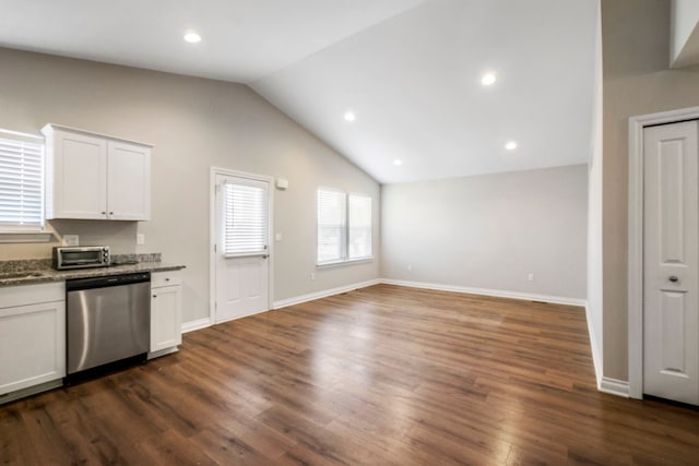 kitchen featuring dishwasher, dark wood-style flooring, vaulted ceiling, and white cabinetry