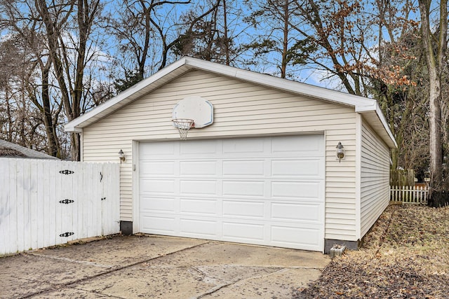 detached garage with fence