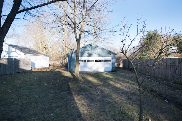 detached garage with fence