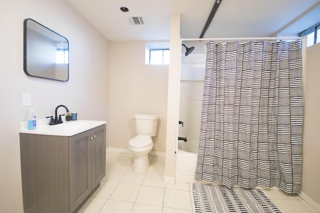 full bath with visible vents, shower / bathtub combination with curtain, toilet, vanity, and tile patterned floors