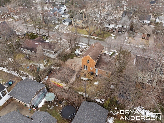 birds eye view of property with a residential view