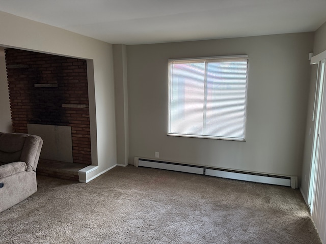 interior space with baseboard heating and carpet