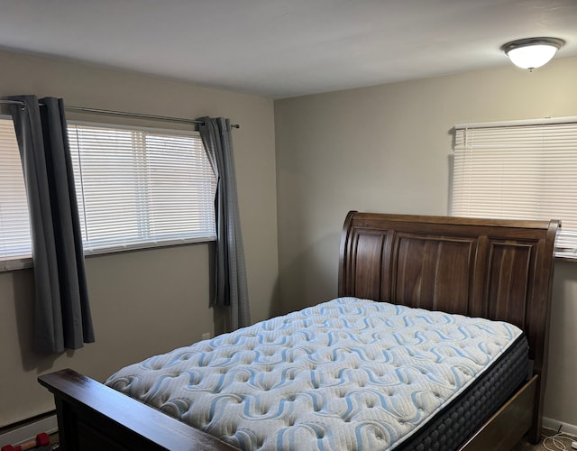 bedroom featuring a baseboard radiator