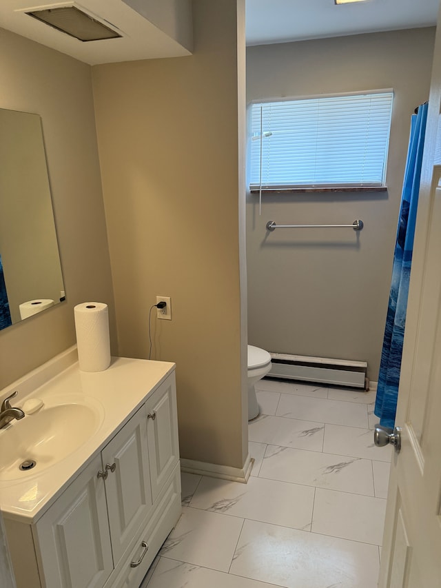 bathroom featuring toilet, marble finish floor, baseboards, baseboard heating, and vanity