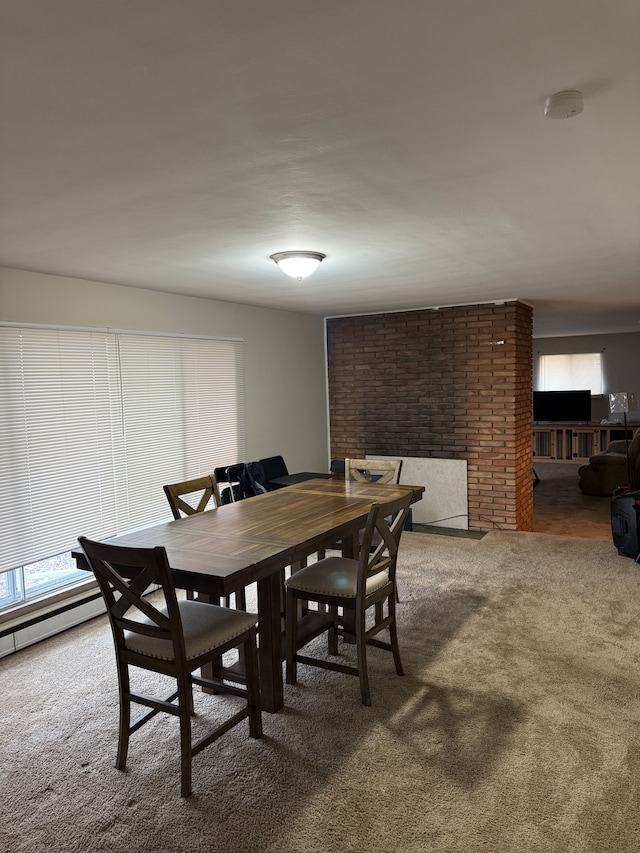 view of carpeted dining area