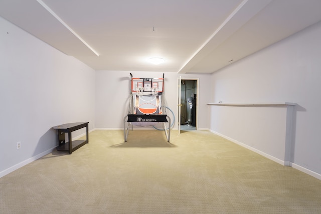 interior space with carpet floors and baseboards