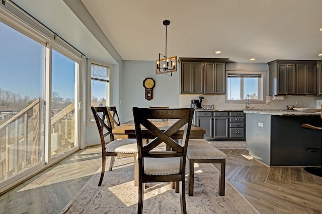 interior space with an inviting chandelier and recessed lighting