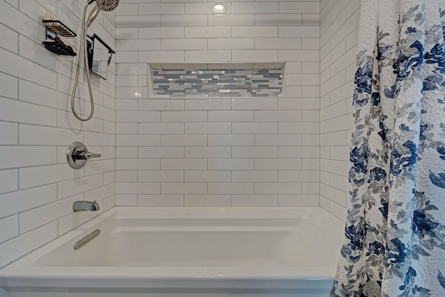 bathroom featuring shower / tub combo with curtain