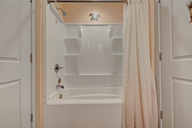 full bathroom featuring shower / tub combo with curtain