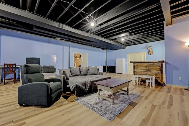 living room with wood finished floors