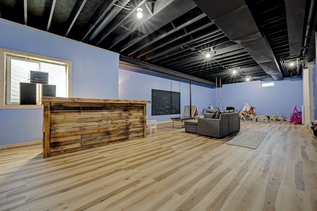 living room with wood finished floors