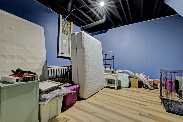 bedroom featuring wood finished floors