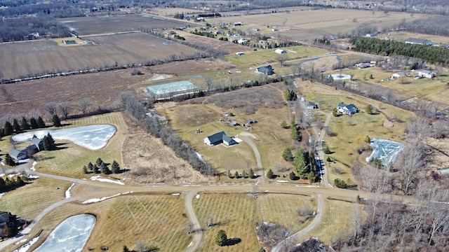 birds eye view of property featuring a rural view