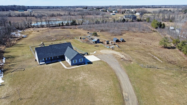 birds eye view of property featuring a rural view