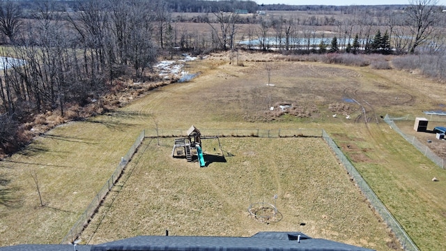 birds eye view of property featuring a rural view