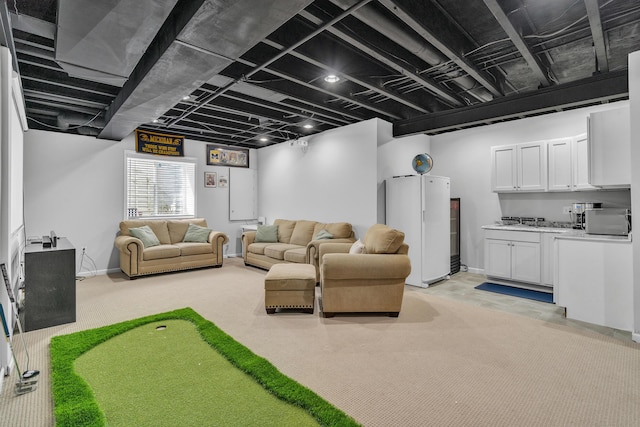 living room with light carpet and baseboards