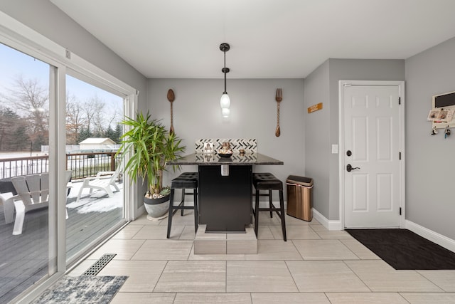 dining room with baseboards