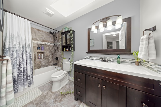 full bath featuring toilet, a skylight, visible vents, vanity, and shower / bath combo with shower curtain