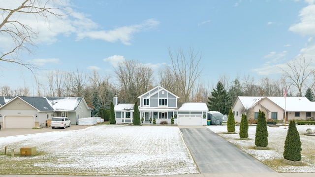 view of front of property featuring an attached garage and driveway