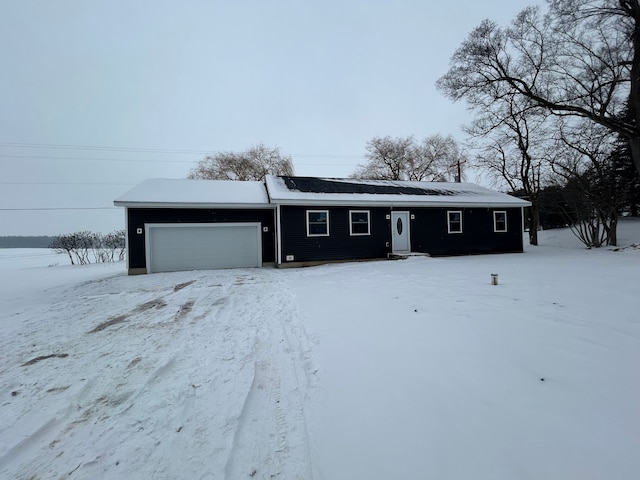 ranch-style home with an attached garage