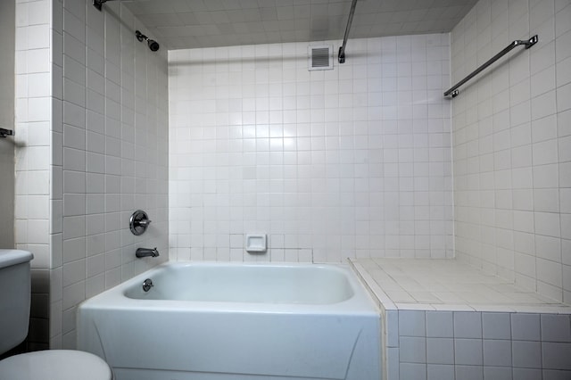 full bath featuring visible vents and toilet