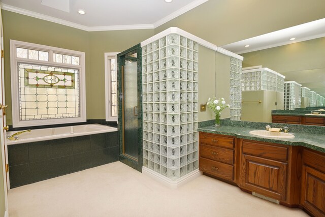 full bathroom featuring vanity, recessed lighting, a stall shower, crown molding, and a bath