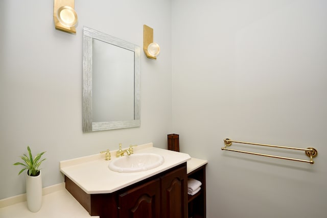 bathroom featuring vanity and baseboards