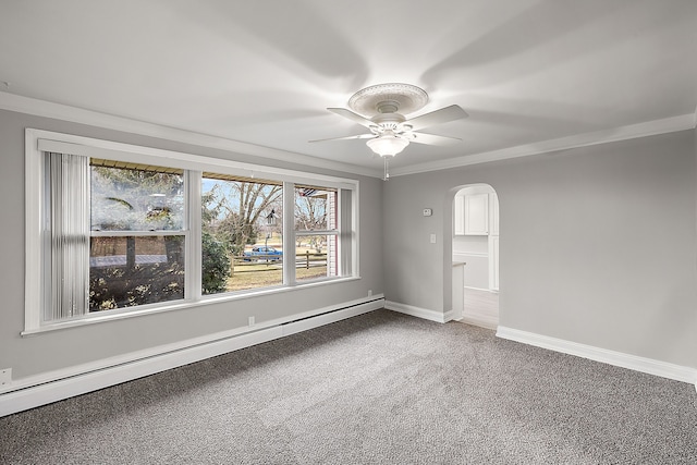 spare room featuring baseboards, arched walkways, a ceiling fan, carpet floors, and a baseboard heating unit