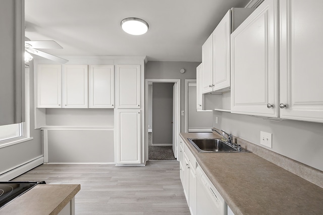 kitchen with white cabinets, dishwasher, a ceiling fan, light wood-style floors, and a sink