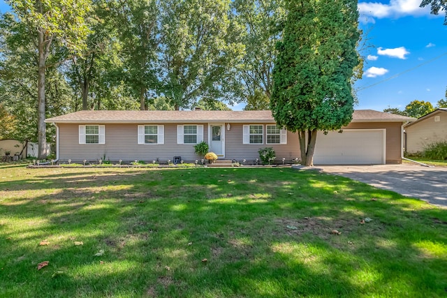 ranch-style house with a front yard, driveway, an attached garage, and entry steps